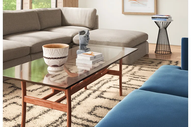 6 Creative Ways to Use Your Glass Coffee Table for the Illusion of The Living Space