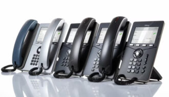 Business Phone Systems: History, Applications, & Key Features